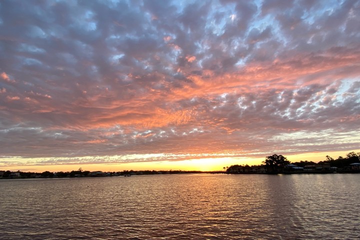 a small boat in a large body of water