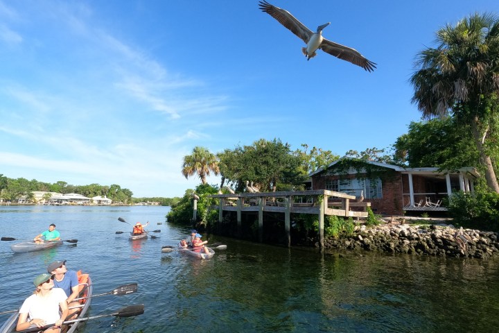 a group of people on a boat in the water