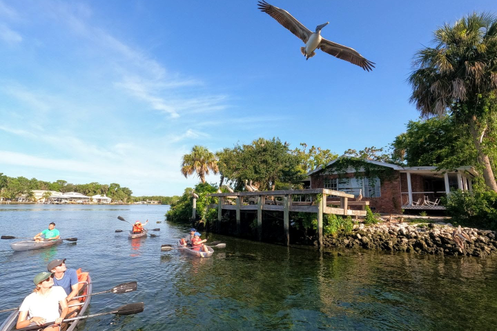 a group of people on a boat in the water