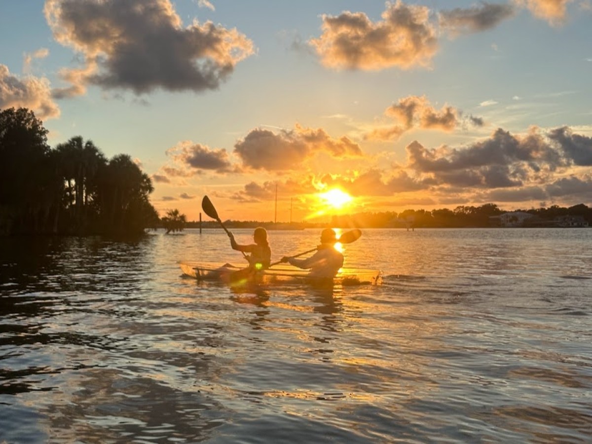a sunset over a body of water